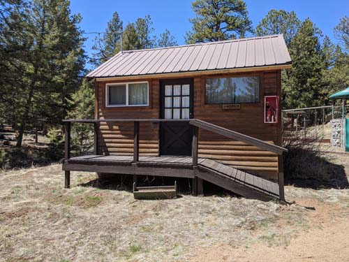The front of Aspen Cabin at Long Scraggy Mountain Ranch in the late summer
