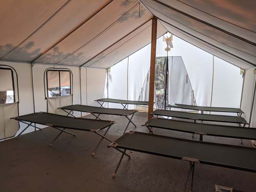 Inside of Canvas Wall Tent with cots